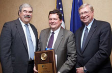 SBDC State Director Jim King, Francis Reilly, and Business Advisor Bernie Ryba